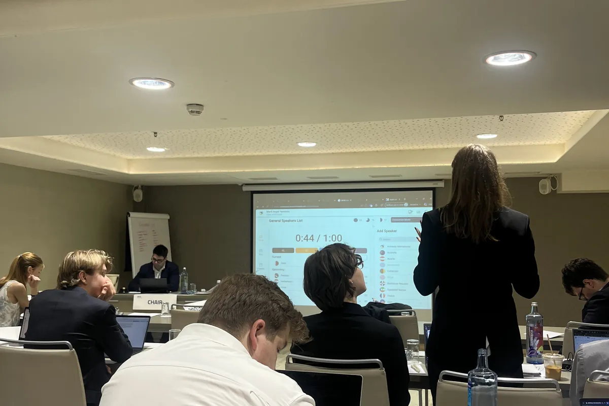 A delegate addressing a committee at a MUN conference